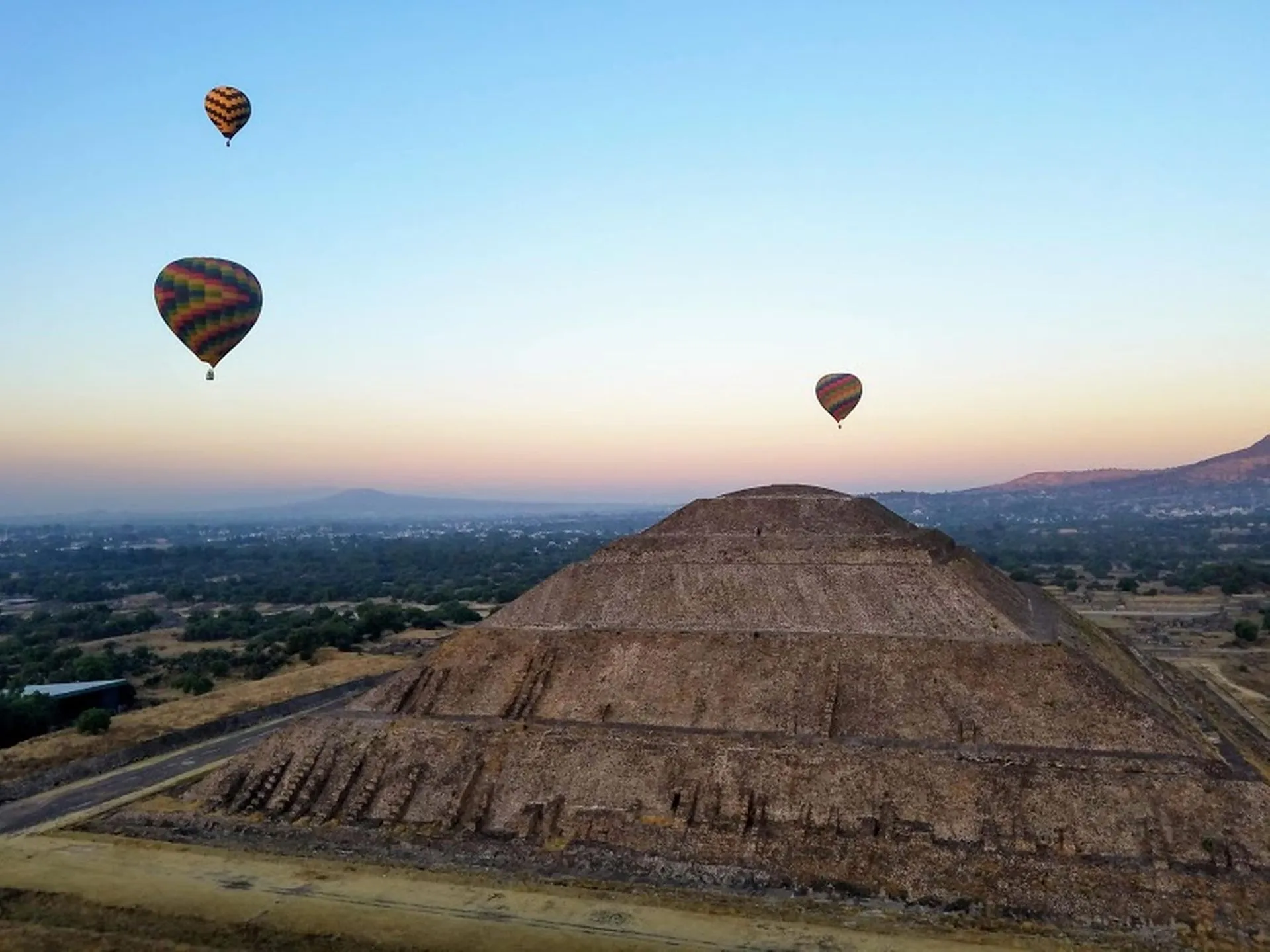 The Pyramid of the Sun at Teotihuacán seen from the Avenue of the Dead on a clear morning