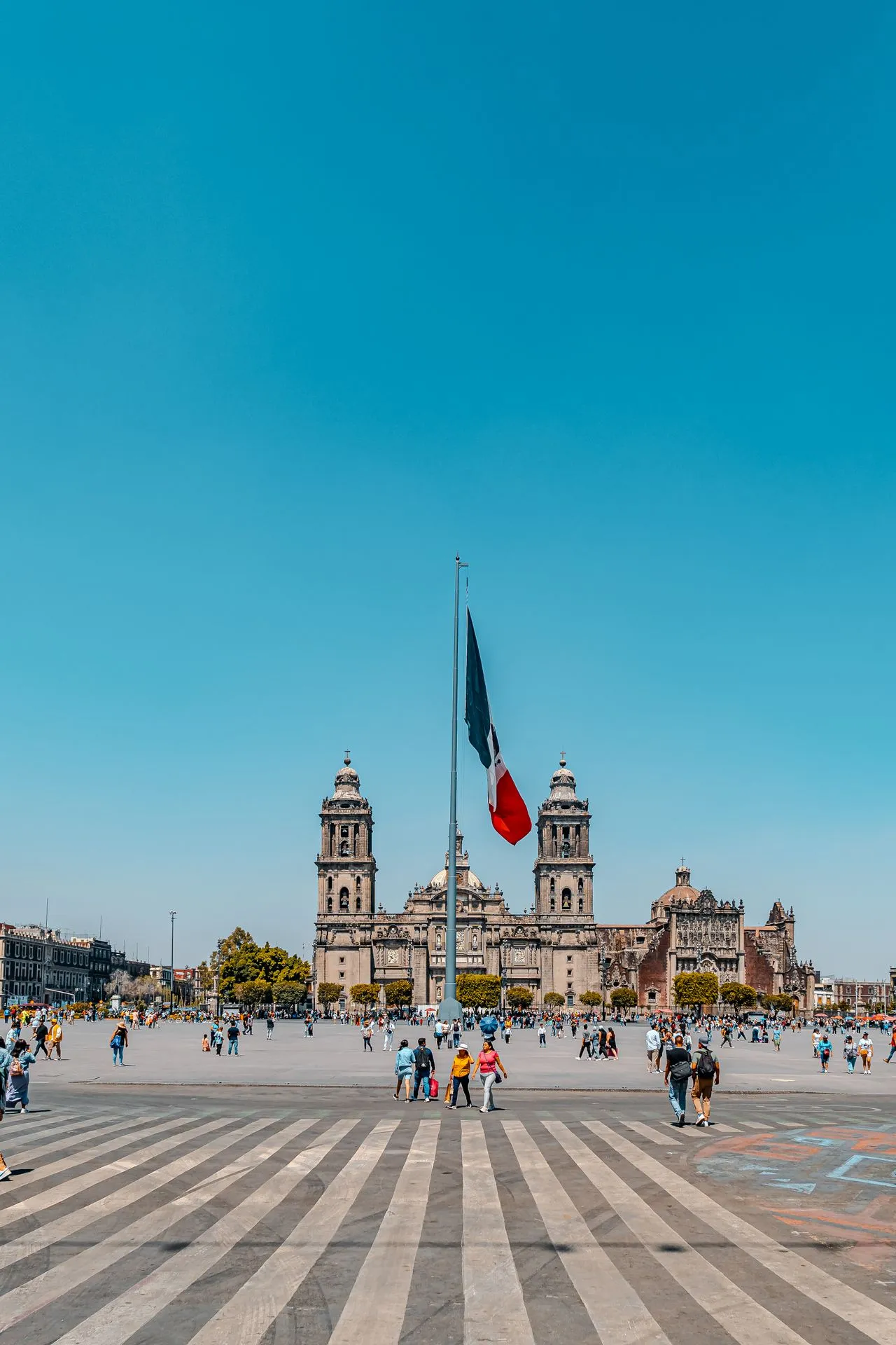The Metropolitan Cathedral and the Mexican flag in Mexico City's main plaza